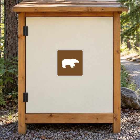 Square road sign sticker with white bear silhouette on dark brown background