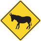 Yellow diamond road sign sticker with black animal silhouette inside