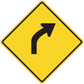 Yellow road sign sticker with black right-turn curved arrow