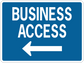 Road sign sticker with blue background, white “BUSINESS ACCESS” text, and left arrow