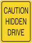 Caution hidden drive road sign sticker, yellow with black border and text