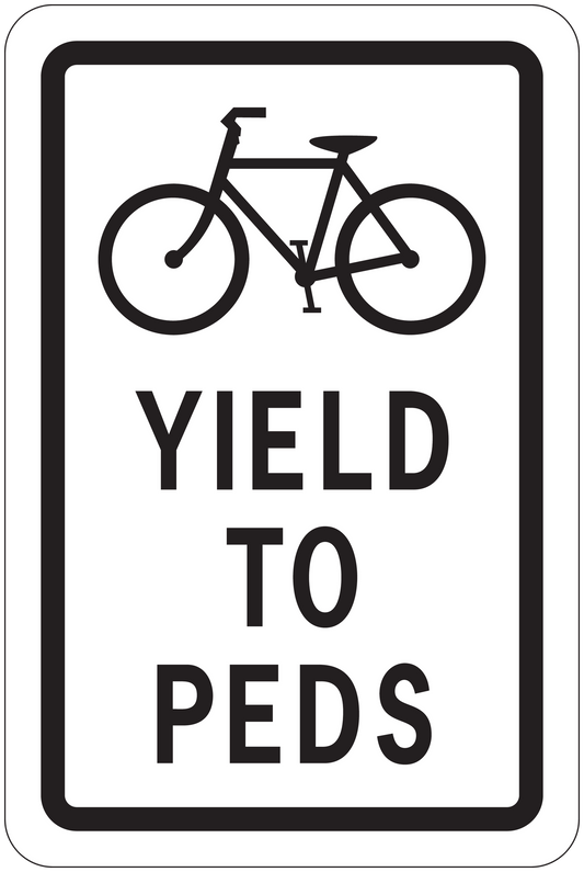 Road sign sticker with cyclist icon and text “YIELD TO PEDS”