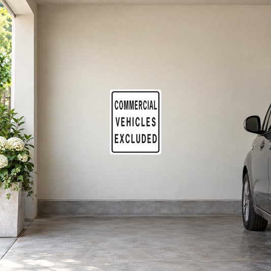 Road sign sticker: white square with 'COMMERCIAL VEHICLES EXCLUDED' text