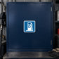 Square road sign sticker with blue outline document symbol on dark background