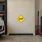 Road sign sticker with yellow diamond and bold 'DIP' text