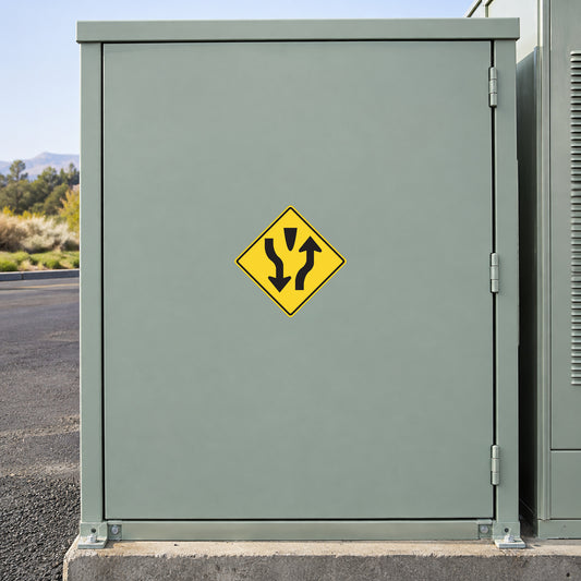Road sign sticker: yellow diamond with black directional arrow symbols