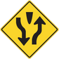 Road sign sticker with yellow diamond and black traffic arrows pointing up and down