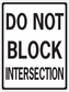 Road sign sticker with bold black text: DO NOT BLOCK INTERSECTION