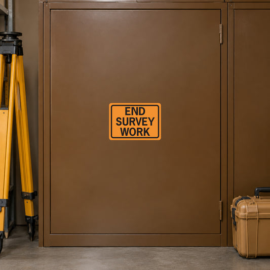 Road Sign Sticker applied in A warm brown surveying equipment locker with tripod edge far left and closed instrument case low right, blank single smooth front