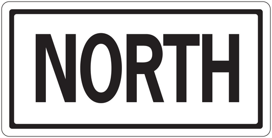 Rectangular road sign sticker with black 'NORTH' text and thin white border