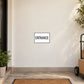 Entrance road sign sticker with black text on white rectangle.