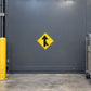 Road sign sticker with yellow diamond and black up-arrow symbol
