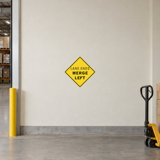 Yellow diamond road sign sticker: 'LANE ENDS MERGE LEFT'