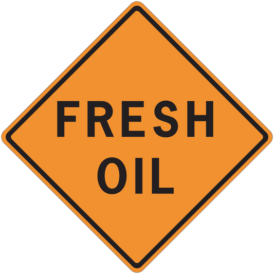 Road sign sticker with orange diamond and black border, reading “FRESH OIL”.