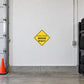 Yellow diamond road sign sticker with “LANE ENDS MERGE RIGHT” text