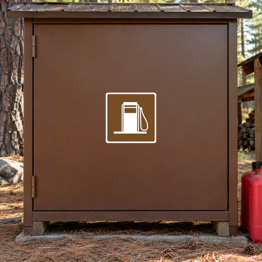 Brown road sign sticker with white gas pump icon inside a square border.