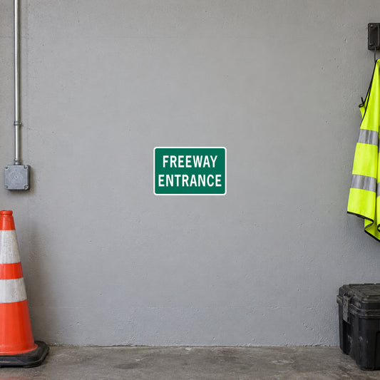 Green freeway entrance road sign sticker with white text
