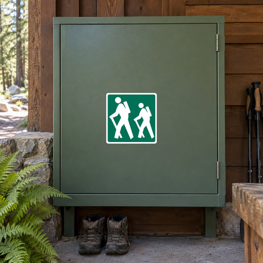 Green road sign sticker with white pedestrian crossing icon