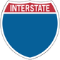 Interstate road sign sticker: red top and blue shield with white INTERSTATE text.