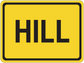 Yellow road sign sticker with black 'HILL' text