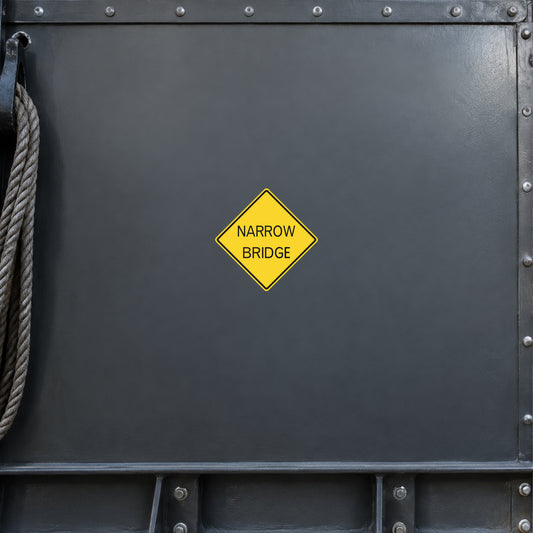 Road sign sticker with yellow diamond 'NARROW BRIDGE' text