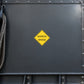 Road sign sticker with yellow diamond 'NARROW BRIDGE' text