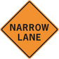 Road sign sticker: orange diamond with black border, 'NARROW LANE' text