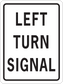 Rectangular road sign sticker with black border and bold text: LEFT TURN SIGNAL