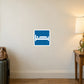 Blue road sign sticker with white bed icon, square border