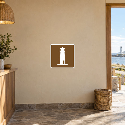 Brown road sign sticker with white lighthouse icon and white border