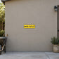 Road sign sticker with yellow 'No Outlet' arrow pointing left