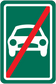 Road sign sticker with car icon and red prohibition slash on green background
