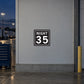 Road sign sticker with 'NIGHT 35' on black square