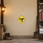Yellow diamond road sign sticker with black T and grid details