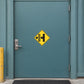 Road sign sticker: yellow diamond warning sign with black roadwork symbol