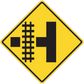 Yellow diamond road sign sticker with black railroad crossing symbol