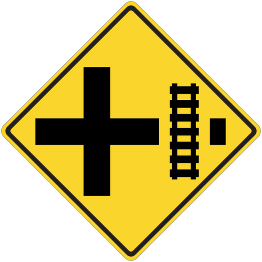 Road sign sticker: yellow diamond with black cross and speed bump style symbol