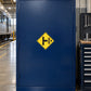 Road sign sticker with yellow diamond hazard symbol and black icon