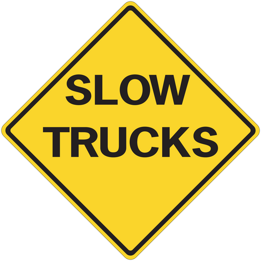 Yellow road sign sticker: diamond SLOW TRUCKS warning text, black border