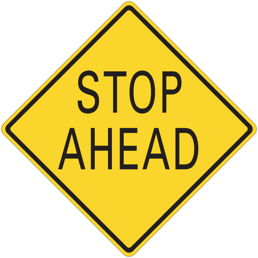 Road sign sticker: yellow diamond with black border reading 'STOP AHEAD'.