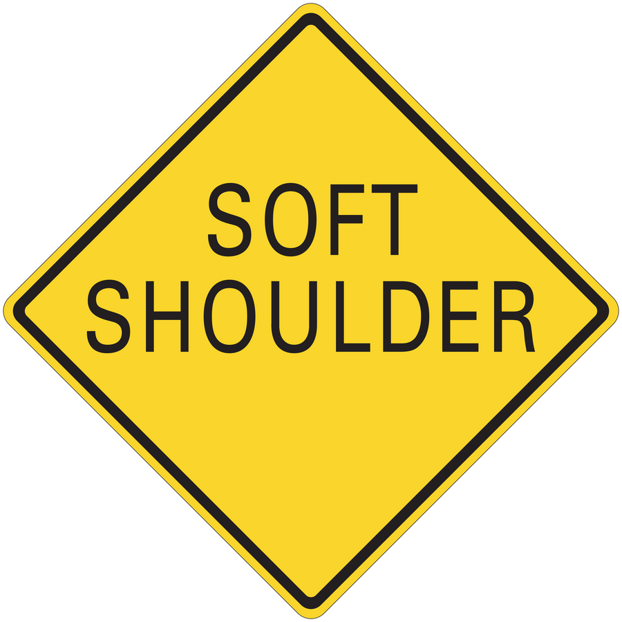 Road sign sticker: yellow diamond with black text "SOFT SHOULDER"