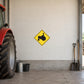 Road sign sticker with yellow diamond and black tractor icon