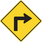 Yellow road sign sticker with black right-turn arrow, diamond border.