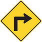 Yellow road sign sticker with black right-turn arrow