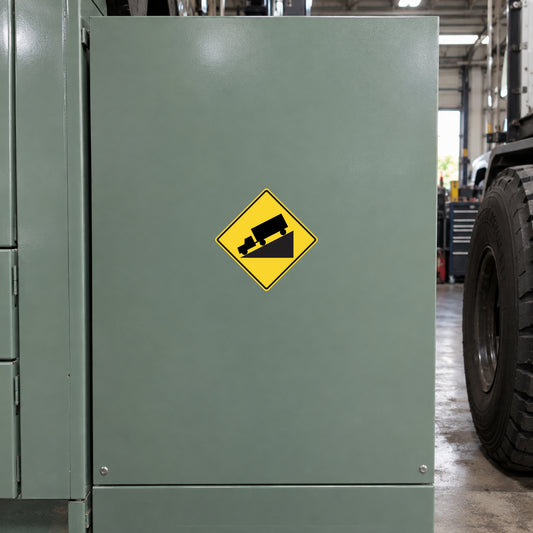 Road sign sticker with yellow diamond and black roadworks symbol