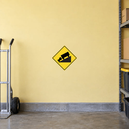 Road sign sticker: yellow diamond with black shovel warning icon
