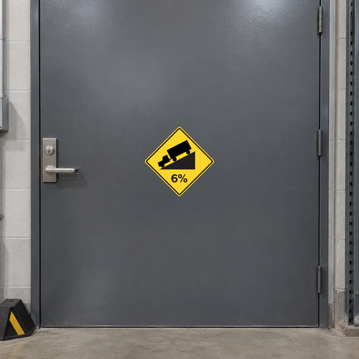 Road sign sticker: yellow diamond with black slope truck icon and 6% text
