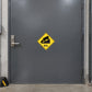 Road sign sticker: yellow diamond with black slope truck icon and 6% text