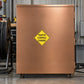 Road Sign Sticker applied in A traffic control equipment workshop, smooth soft copper cabinet front, cable reel extreme left