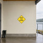Yellow diamond road sign sticker: WATER OVER ROADWAY